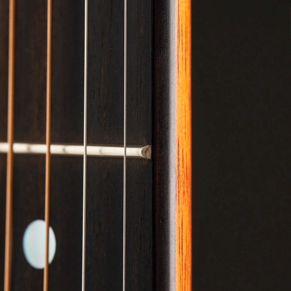 Thinner fingerboard with a gently beveled comfort edge